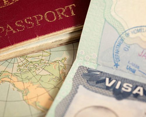 "US visa, vintage map and passport background"